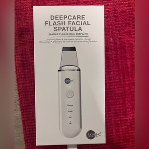 SkinInc deep care flash facial spatula. New in the box never used
